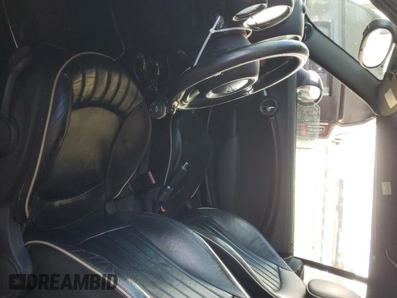 2011 MINI Convertible с VIN WMWZN3C59BTZ89481, выставлен на аукционе Copart как лот 66878275 с пробегом 161 303 миль миль и Чистый • Clean title. История ставок и продаж доступна на DreamBid. Изображение 7.