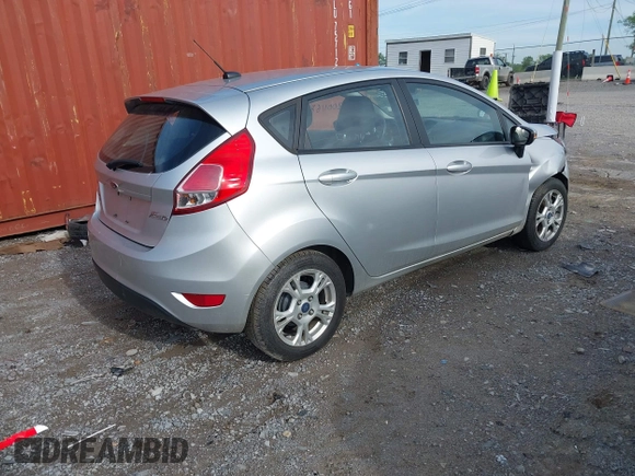 2014 Ford Fiesta SE with VIN 3FADP4EJ0EM215958, listed as a IAAI auction lot 42001168 with 115,231 mi miles and . Bid and sale history available at DreamBid. Image 4.