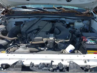 2015 Toyota Tacoma with VIN 3TMLU4EN1FM195626, listed as a IAAI auction lot 42571649 with 135,699 mi miles and . Bid and sale history available at DreamBid. Image 10.