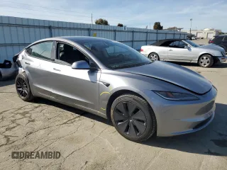 2025 Tesla Model 3 Long Range with VIN 5YJ3E1EA8SF890337, listed as a Copart auction lot 45023425 with 1,765 mi miles and Salvage Title. Bid and sale history available at DreamBid. Image 4.