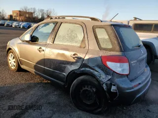 2010 Suzuki SX4 with VIN JS2YB5A31A6300055, listed as a Copart auction lot 82596904 with 80,715 mi miles and Salvage Title. Bid and sale history available at carsss.com. Image 2.