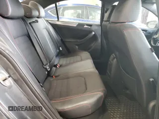 2014 Volkswagen Jetta GLI z VIN 3VW4T7AJ6EM398115, wystawiony jako Copart lot #89179925 z przebiegiem 81 264 mil mil oraz Szkoda całkowita • Salvage title. Historia ofert i sprzedaży dostępna na DreamBid. Obrazek 10.
