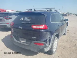 2015 Jeep Cherokee Latitude with VIN 1C4PJLCB9FW683459, listed as a IAAI auction lot 41998309 with 176,769 mi miles and . Bid and sale history available at carsss.com. Image 4.