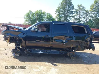 2013 Chevrolet Tahoe LS with VIN 1GNSCAE06DR263469, listed as a IAAI auction lot 42245636 with 240,506 mi miles and . Bid and sale history available at DreamBid. Image 6.