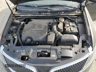 2014 Lincoln MKS with VIN 1LNHL9EK2EG610291, listed as a Copart auction lot 54544745 with 147,075 mi miles and Salvage Title. Bid and sale history available at carsss.com. Image 11.