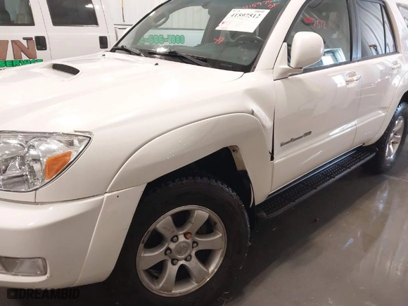 2005 Toyota 4Runner SR5 with VIN JTEBT14R450051986, listed as a IAAI auction lot 41597512 with 113,042 mi miles. Bid and sale history available at carsss.com. Image 6.