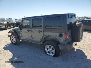2015 Jeep Wrangler Unlimited Sahara with VIN 1C4BJWEGXFL624846, listed as a Copart auction lot 47949535 with 125,710 mi miles and Salvage Title. Bid and sale history available at carsss.com. Image 2.