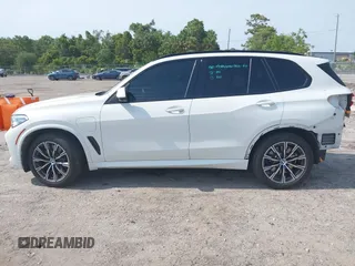 2021 BMW X5 xDrive45e with VIN 5UXTA6C08M9F38909, listed as a IAAI auction lot 42172536 with 71,741 mi miles and . Bid and sale history available at DreamBid. Image 15.