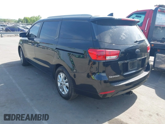 2015 Kia Sedona LX with VIN KNDMB5C17F6069139, listed as a IAAI auction lot 42064125 with 226,244 mi miles and . Bid and sale history available at DreamBid. Image 3.