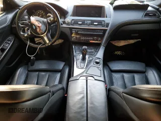 2014 BMW 6 Series 650i xDrive z VIN WBA6B4C54ED371520, wystawiony jako Copart lot #75107784 z przebiegiem 136 077 mil mil oraz Szkoda całkowita • Salvage title. Historia ofert i sprzedaży dostępna na DreamBid. Obrazek 8.