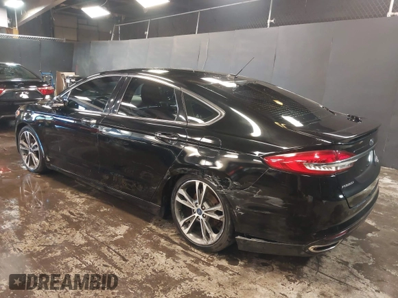 2017 Ford Fusion Titanium with VIN 3FA6P0D93HR197617, listed as a IAAI auction lot 41673022 with 65,041 mi miles and . Bid and sale history available at DreamBid. Image 3.