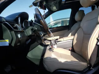 2014 Mercedes-Benz M 350 with VIN 4JGDA2EB5EA336177, listed as a Copart auction lot 52234585 with 139,654 mi miles and Salvage Title. Bid and sale history available at DreamBid. Image 7.