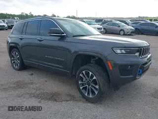 2022 Jeep Grand Cherokee Overland with VIN 1C4RJYD67N8757973, listed as a IAAI auction lot 42136669 with 26,976 mi miles and . Bid and sale history available at DreamBid. Image 1.