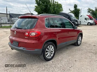2011 Volkswagen Tiguan SEL with VIN WVGAV7AX1BW000384, listed as a Copart auction lot 59420805 with 166,245 mi miles and Clean title. Bid and sale history available at DreamBid. Image 4.