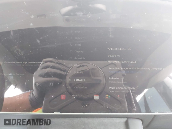 2022 Tesla Model 3 with VIN 5YJ3E1EA7NF314744, listed as a IAAI auction lot 42057596 with 30,936 mi miles and . Bid and sale history available at DreamBid. Image 7.