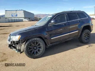 2011 Jeep Grand Cherokee 70th Anniversary with VIN 1J4RR4GT4BC511713, listed as a Copart auction lot 85508804 with 121,972 mi miles and Salvage Title. Bid and sale history available at carsss.com. Image 1.