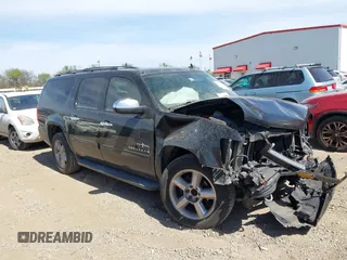 2012 Chevrolet Suburban LS with VIN 1GNSCHE03CR241355, listed as a IAAI auction lot 41791615 with 214,964 mi miles. Bid and sale history available at carsss.com. Image 1.