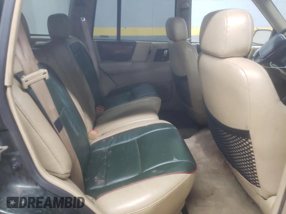 1995 Jeep Grand Cherokee Limited z VIN 1J4GZ78S7SC766726, wystawiony jako Copart lot #84909134 z przebiegiem 174 256 mil mil oraz Szkoda całkowita • Salvage title. Historia ofert i sprzedaży dostępna na DreamBid. Obrazek 11.