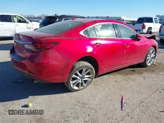2017 Mazda 6 Touring with VIN JM1GL1V51H1126762, listed as a IAAI auction lot 41394606 with 62,072 mi miles and . Bid and sale history available at DreamBid. Image 4.