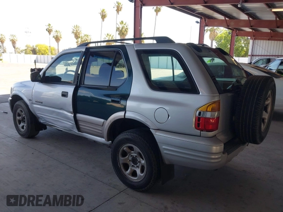 2001 Honda Passport LX z VIN 4S6CK58WX14402974, wystawiony jako IAAI lot #42374779 z przebiegiem 214 931 mil mil oraz . Historia ofert i sprzedaży dostępna na DreamBid. Obrazek 3.