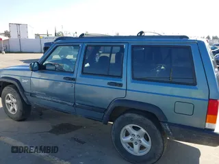 1998 Jeep Cherokee Sport with VIN 1J4FT68S0WL231959, listed as a IAAI auction lot 41680076 with 252,369 mi miles. Bid and sale history available at carsss.com. Image 14.
