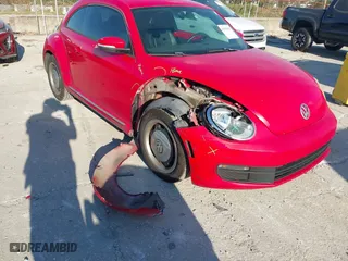 2012 Volkswagen Beetle 2.5L with VIN 3VWJX7AT5CM648739, listed as a IAAI auction lot 41547850 with 214,941 mi miles. Bid and sale history available at carsss.com. Image 6.