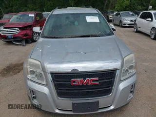 2015 GMC Terrain SLE z VIN 2GKFLWEK8F6272041, wystawiony jako IAAI lot #42308812 z przebiegiem 188 543 mil mil oraz . Historia ofert i sprzedaży dostępna na DreamBid. Obrazek 6.