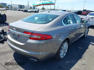2010 Jaguar XF Premium Luxury with VIN SAJWA0GB6ALR77790, listed as a IAAI auction lot 41987113 with 69,094 mi miles. Bid and sale history available at carsss.com. Image 4.