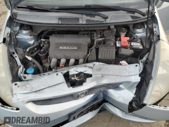 2007 Honda Fit с VIN JHMGD37477S061646, выставлен на аукционе Copart как лот 86438584 с пробегом 191 687 миль миль и Списание • Salvage title. История ставок и продаж доступна на DreamBid. Изображение 11.