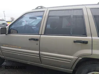 1998 Jeep Grand Cherokee Limited with VIN 1J4GZ78YXWC236969, listed as a IAAI auction lot 41095686 with 182,001 mi miles. Bid and sale history available at carsss.com. Image 15.