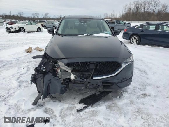 2019 Mazda CX-5 Touring with VIN JM3KFBCM0K0607933, listed as a Copart auction lot 46260815 with 64,349 mi miles and Salvage Title. Bid and sale history available at carsss.com. Image 5.