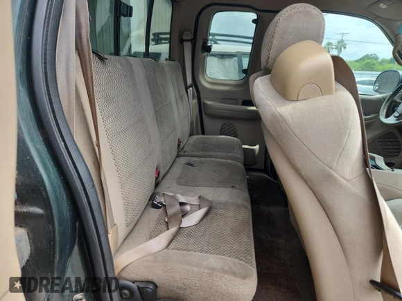 2001 Ford F-150 XL with VIN 1FTRX17L51NA83857, listed as a Copart auction lot 62759145 with 215,961 mi miles and Salvage title. Bid and sale history available at DreamBid. Image 10.