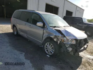 2016 Dodge Grand Caravan SXT with VIN 2C4RDGCG4GR176028, listed as a Copart auction lot 54920445 with 157,131 mi miles and Salvage Title. Bid and sale history available at DreamBid. Image 4.