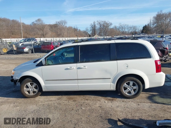 2010 Dodge Grand Caravan SXT with VIN 2D4RN5DX8AR239352, listed as a IAAI auction lot 41773487 with 86,084 mi miles and . Bid and sale history available at DreamBid. Image 14.