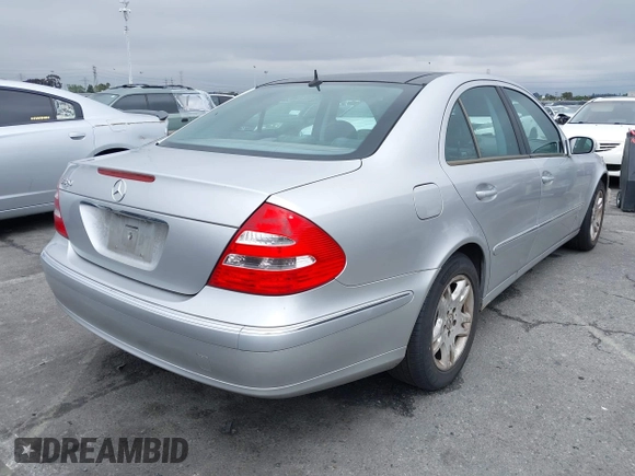 2005 Mercedes-Benz E-Class 3.2L with VIN WDBUF65J45A658795, listed as a IAAI auction lot 41923148 with 106,832 mi miles. Bid and sale history available at carsss.com. Image 4.