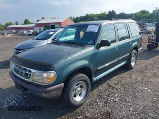 1996 Ford Explorer XL with VIN 1FMDU34X3TUC22832, listed as a IAAI auction lot 42738515 with 165,408 mi miles and . Bid and sale history available at DreamBid. Image 2.