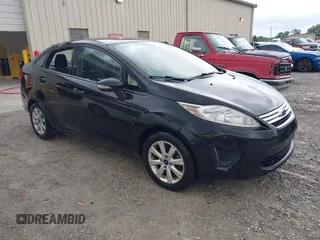 2013 Ford Fiesta SE z VIN 3FADP4BJ6DM218088, wystawiony jako IAAI lot #42319209 z przebiegiem 109 208 mil mil oraz . Historia ofert i sprzedaży dostępna na DreamBid. Obrazek 1.