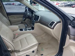 2015 Jeep Grand Cherokee Overland with VIN 1C4RJECG3FC152601, listed as a IAAI auction lot 42414340 with 139,315 mi miles and . Bid and sale history available at DreamBid. Image 5.