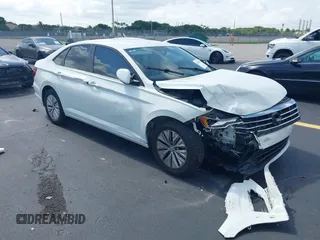 2019 Volkswagen Jetta S z VIN 3VWC57BU5KM179110, wystawiony jako IAAI lot #42366218 z przebiegiem 143 115 mil mil oraz . Historia ofert i sprzedaży dostępna na DreamBid. Obrazek 1.