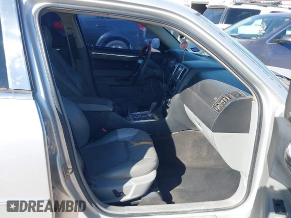 2006 Chrysler 300 C with VIN 2C3KA63H46H154990, listed as a IAAI auction lot 42004790 with 233,673 mi miles. Bid and sale history available at carsss.com. Image 5.