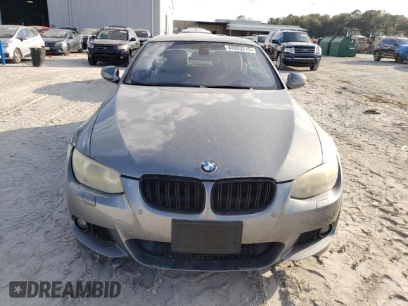 2011 BMW 3 Series 335i with VIN WBADX7C5XBE580244, listed as a Copart auction lot 44993215 with 124,091 mi miles and Salvage Title. Bid and sale history available at carsss.com. Image 5.
