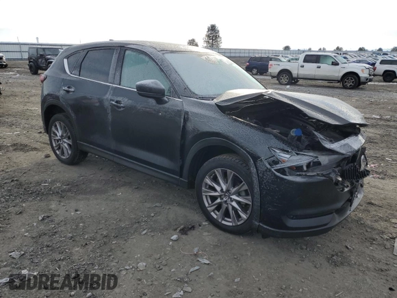 2019 Mazda CX-5 Grand Touring with VIN JM3KFBDM9K1650840, listed as a Copart auction lot 41929185 with 61,814 mi miles and Salvage Title. Bid and sale history available at carsss.com. Image 4.