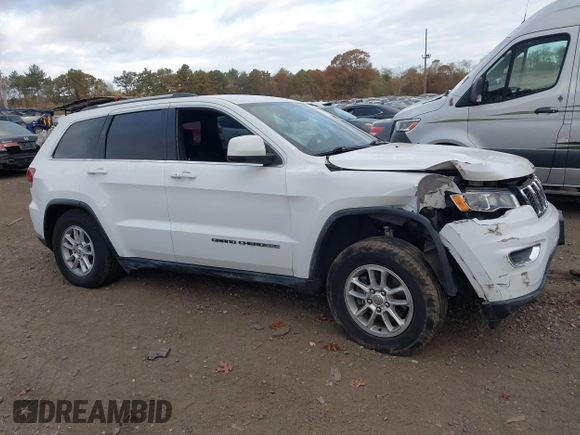 2020 Jeep Grand Cherokee Altitude z VIN 1C4RJFAGXLC433962, wystawiony jako IAAI lot #40721842 z przebiegiem 73 528 mil mil oraz . Historia ofert i sprzedaży dostępna na DreamBid. Obrazek 13.