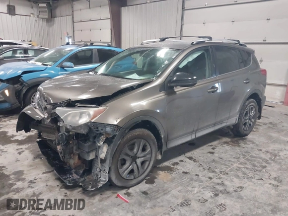 2014 Toyota RAV4 LE with VIN 2T3BFREV3EW140059, listed as a IAAI auction lot 41613214 with 168,165 mi miles and . Bid and sale history available at DreamBid. Image 2.