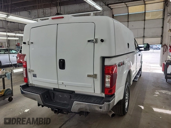 2020 Ford F-250 XL with VIN 1FT7X2B65LEC53720, listed as a IAAI auction lot 42836279 with 125,668 mi miles and . Bid and sale history available at DreamBid. Image 4.