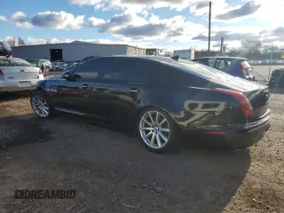 2015 Jaguar XJ Portfolio with VIN SAJWJ2GD2F8V76289, listed as a Copart auction lot 48222815 with 95,420 mi miles and Salvage title. Bid and sale history available at DreamBid. Image 2.