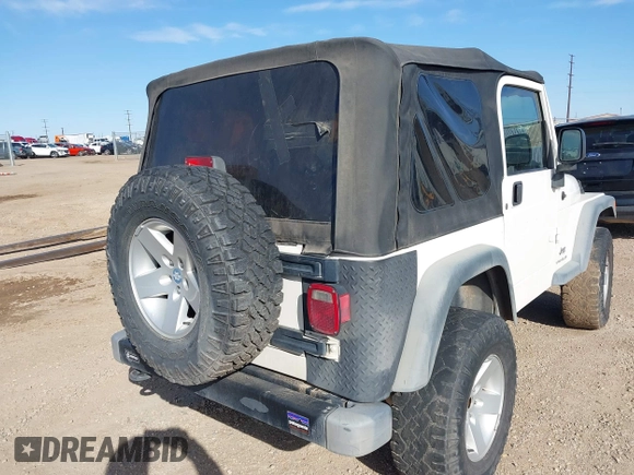 2005 Jeep Wrangler Sport with VIN 1J4FA49SX5P336380, listed as a IAAI auction lot 41752554 with 139,004 mi miles. Bid and sale history available at carsss.com. Image 6.