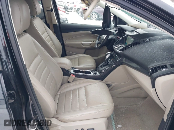 2016 Ford Escape Titanium with VIN 1FMCU9J96GUC08563, listed as a IAAI auction lot 41252475 with 120,404 mi miles. Bid and sale history available at carsss.com. Image 5.