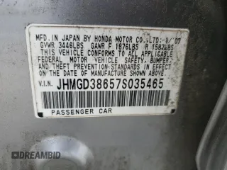 2007 Honda Fit Sport z VIN JHMGD38657S035465, wystawiony jako Copart lot #57635245 z przebiegiem 184 627 mil mil oraz Szkoda całkowita • Salvage title. Historia ofert i sprzedaży dostępna na DreamBid. Obrazek 12.