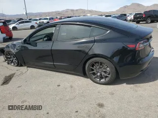 2021 Tesla Model 3 Standard Range Plus with VIN 5YJ3E1EA0MF997191, listed as a Copart auction lot 49659825 with 40,647 mi miles and Salvage Title. Bid and sale history available at DreamBid. Image 2.